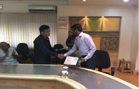 IQAG Chairman Damodar Aveli signing MOU with ESCI